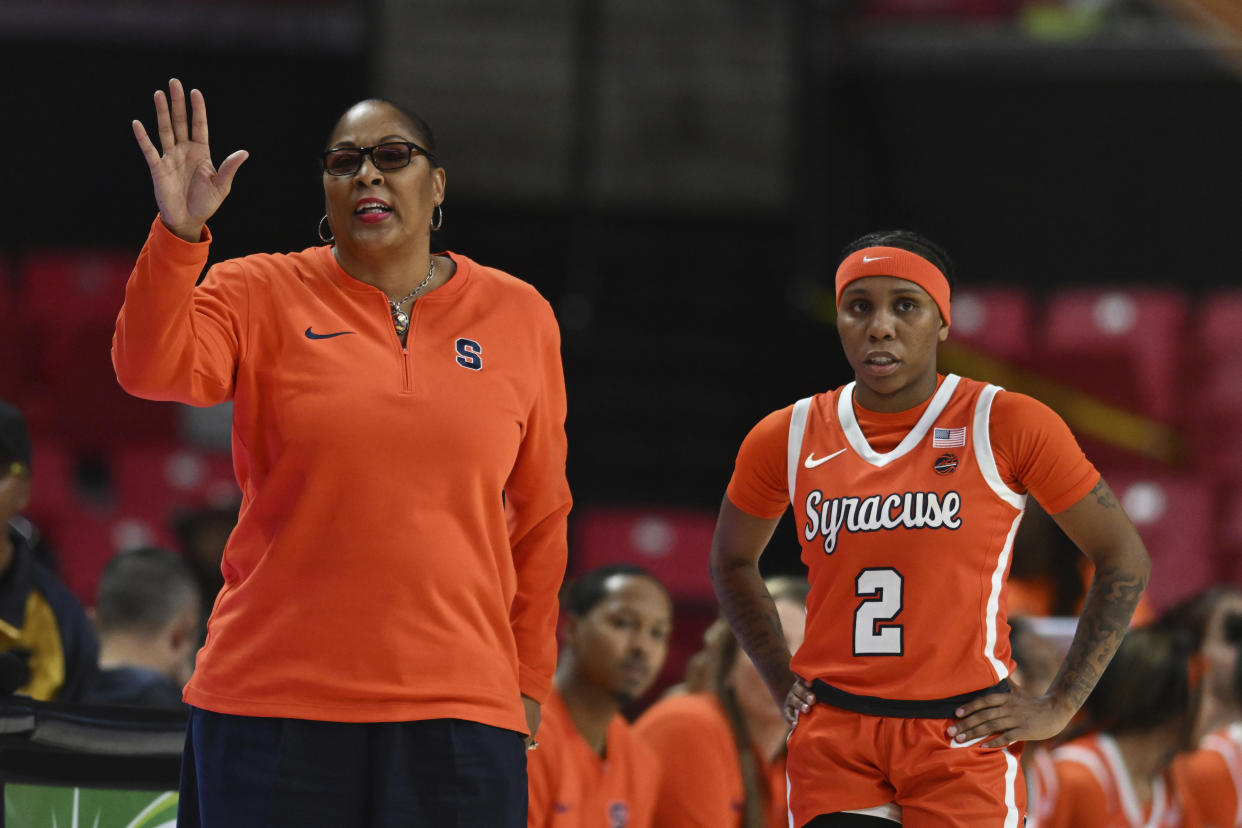 Syracuse coach Felisha Legette-Jack and Dyaisha Fair on the sideline during a game on Nov. 19, 2023. (AP Photo/Gail Burton)