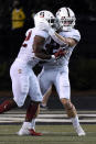 Stanford's Casey Filkins (2) celebrates with running back E.J. Smith (22) after Smith scored a touchdown against Vanderbilt during the second half of an NCAA college football game Saturday, Sept. 18, 2021, in Nashville, Tenn. (AP Photo/Mark Zaleski)