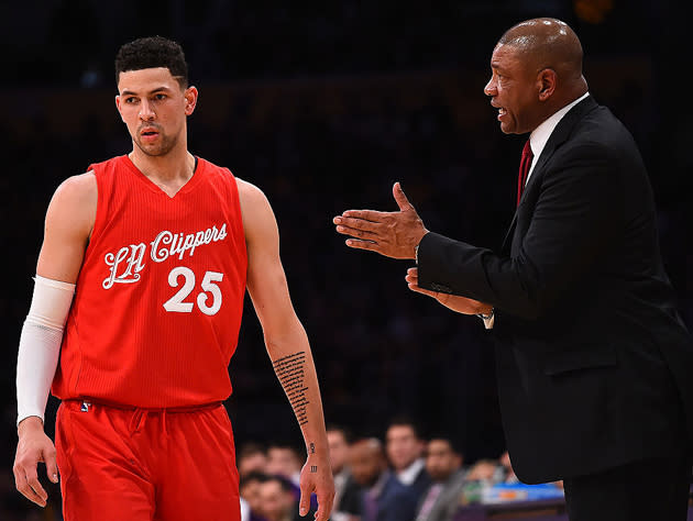 Austin and Doc Rivers talk their way through winter. (Getty Images)
