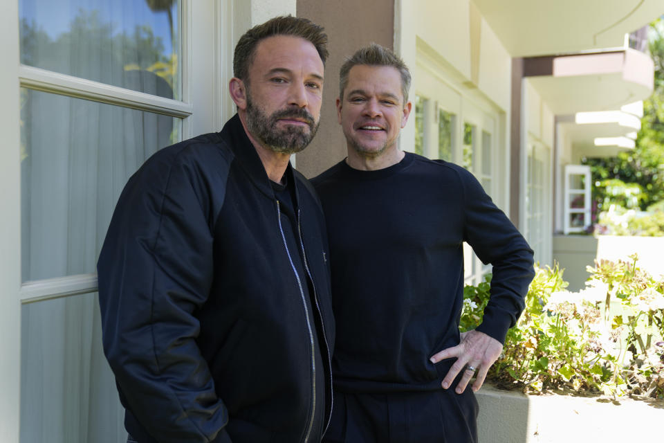 Ben Affleck, left, and Matt Damon pose for a portrait to promote the film "Air" on Monday, March 27, 2023, at the Four Seasons Hotel in Los Angeles. (AP Photo/Ashley Landis)