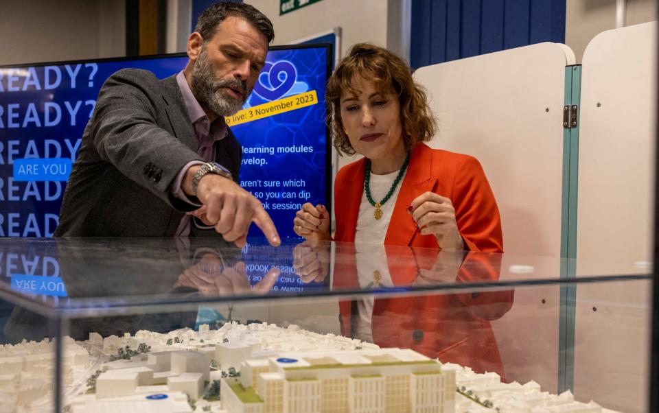 Victoria Atkins is shown plans for the construction of a new site at Hillingdon Hospital