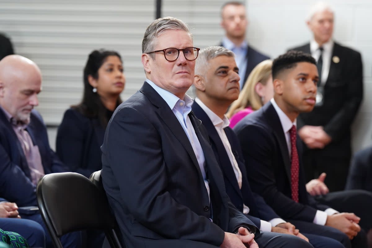 Labour leader Sir Keir Starmer, seated next to the Mayor of London, Sadiq Khan (Stefan Rousseau/PA Wire)