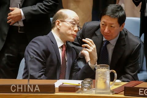 China ambassador to the United Nations, Liu Jieyi attends a meeting a the UN Security Council over North Korea's new sanctions  - Credit: AFP