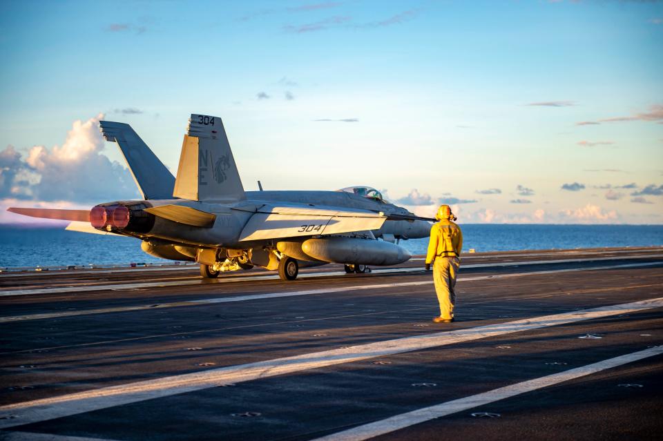 An F/A-18E Super Hornet launches off the flight deck aboard Nimitz-class aircraft carrier USS Carl Vinson on Sept. 17, 2021.