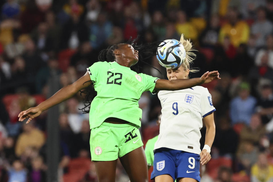 Nigeria's Michelle Alozie, left, and England's Rachel Daly go for a header during the Women's World Cup round of 16 soccer match between England and Nigeria in Brisbane, Australia, Monday, Aug. 7, 2023. (AP Photo/Tertius Pickard)