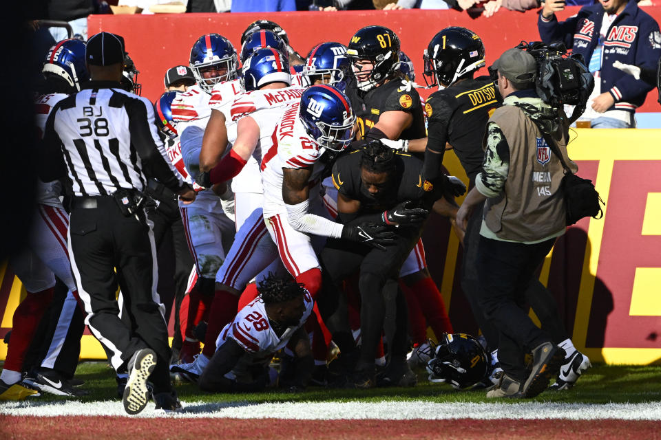 Commanders wide receiver Curtis Samuel (center) was ejected as part of a brawl between Washington and the New York Giants on Sunday. (Brad Mills-USA TODAY Sports)