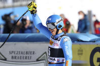 Italy's Elena Curtoni celebrates in the finish area of an alpine ski, women's World Cup super-G race in Cortina d'Ampezzo, Italy, Sunday, Jan. 23, 2022. (AP Photo/Alessandro Trovati)