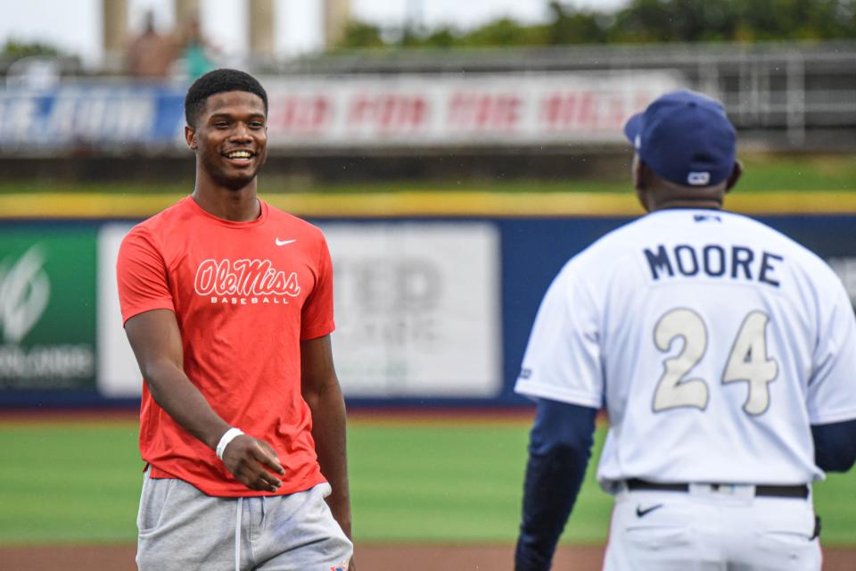 Pensacola Catholic alum and Ole Miss outfielder T.J. McCants tossed the first pitch to Tuesday's Pensacola Blue Wahoos' game against the Chattanooga Lookouts on  July 12, 2022 from Blue Wahoos Stadium.