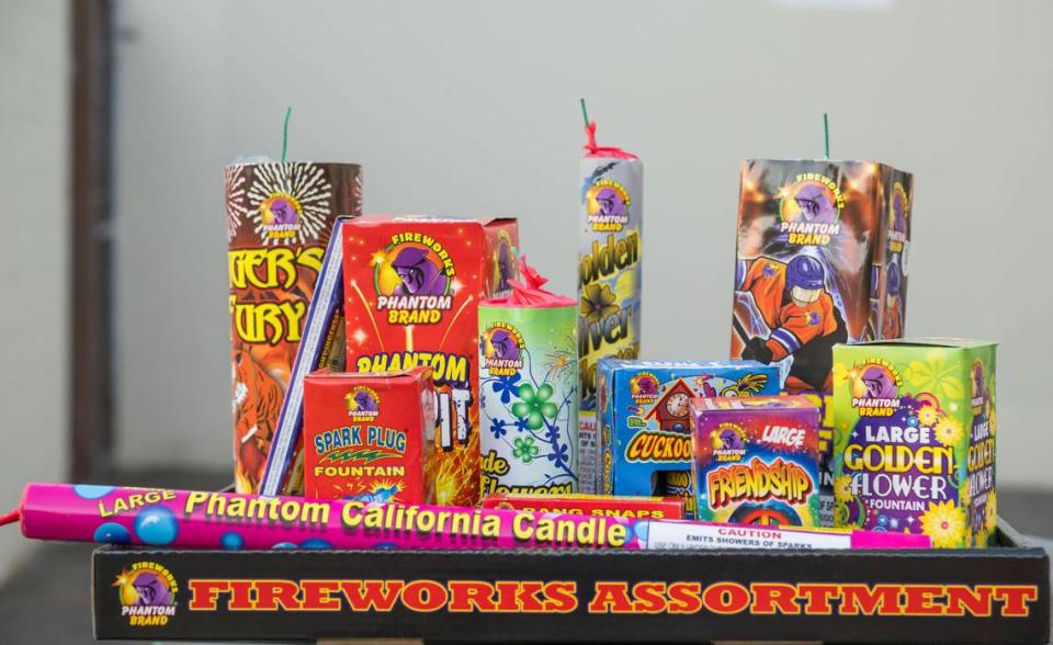 The Phantom Chamber of Sparks variety box of fireworks were purchased by The Sacramento Bee intern Angela Rodriguez, who went out with a $100 budget, seen Wednesday, June 28, 2023, before lighting near Sacramento Fire Department Station 4. Xavier Mascareñas/xmascarenas@sacbee.com