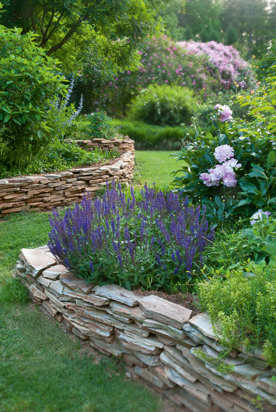 6. Build low random stone walls to create rustic raised beds