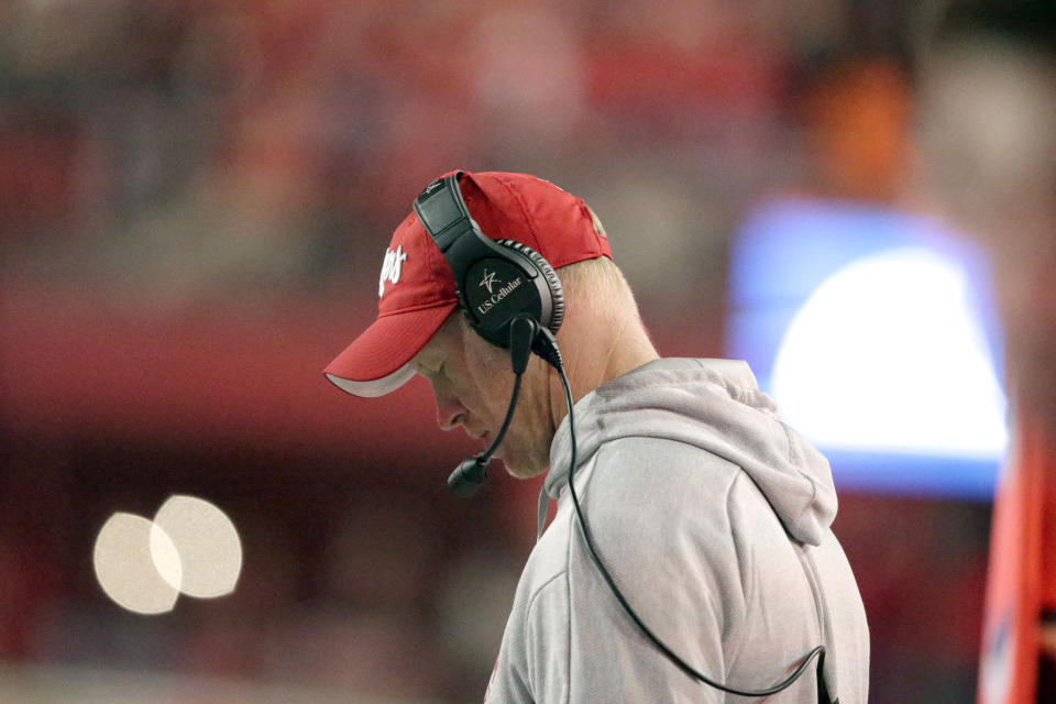 Nebraska head coach Scott Frost consults his notes during the second half of an NCAA college football game against Ohio State in Lincoln, Neb., Saturday, Sept. 28, 2019. Ohio State won 48-7. (AP Photo/Nati Harnik)