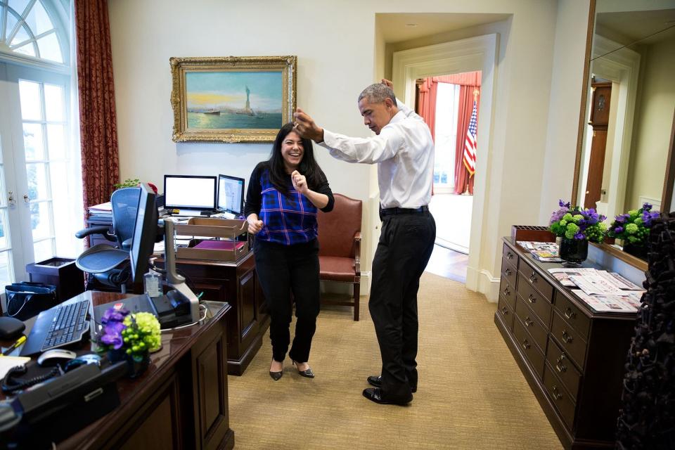 Obama dances in the Outer Oval with personal aide Ferial Govashiri on March 16