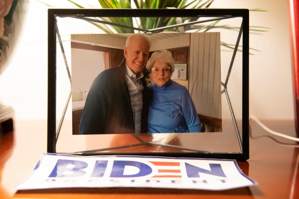 A photo of Anne Kearns with Joe Biden, taken earlier this year, is displayed on a table Kearns' Scranton, Pa., home on Wednesday, October 14, 2020. Biden spent the first ten years of his life growing up in the house. 