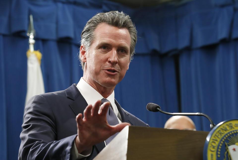 California Gov. Gavin Newsom responds to a reporter's question about his executive order advising that non-essential gatherings of more than 250 people should be canceled until at least the end of March, during a news conference in Sacramento, Calif., Thursday, March 12, 2020. (AP Photo/Rich Pedroncelli)