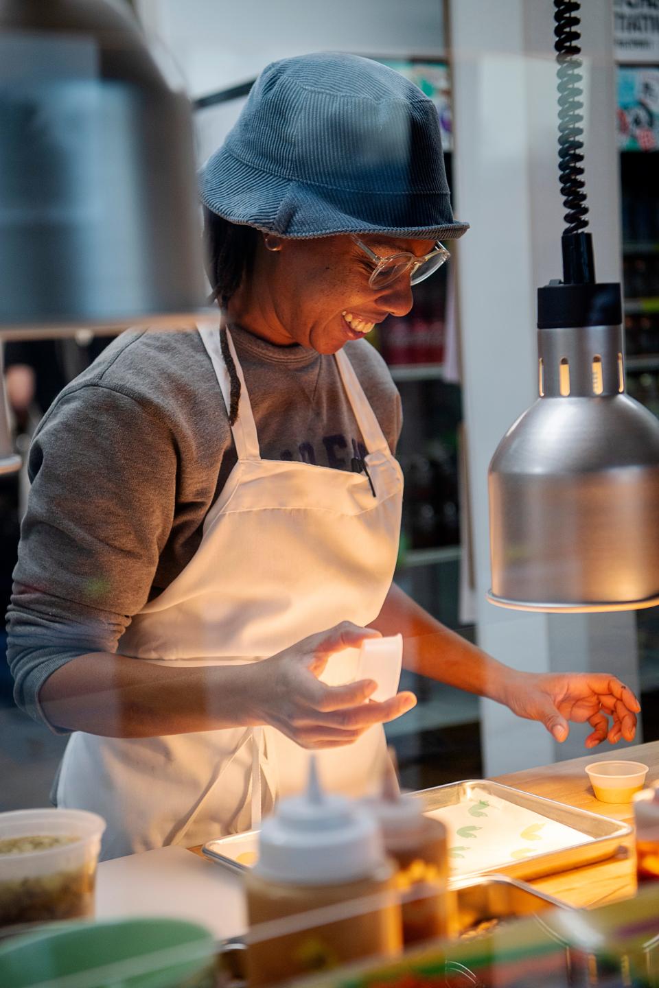 Chef Ashleigh Shanti prepares an order at Good Hot Fish, January 19, 2024.