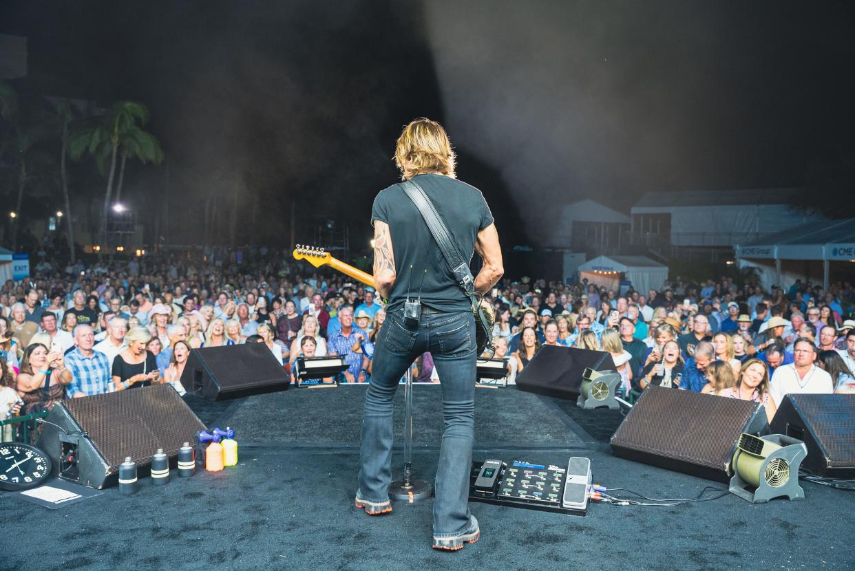 Country music superstar Keith Urban and his band perform in Naples on Nov. 16, 2022, at Tiburon Golf Club before about 2,000, including many first responders to thank them for their efforts in the aftermath of Hurricane Ian. (Photo by Brendan Williamson)