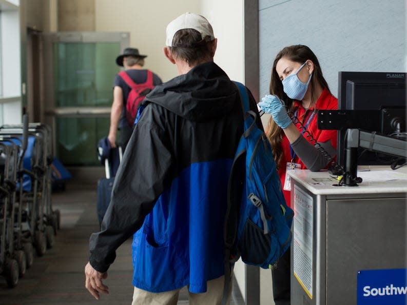 Passengers board Southwest flight during covid-19