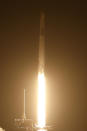 A SpaceX Falcon 9 rocket with the Crew Dragon spacecraft with astronauts on a mission to the International Space Station lifts off from pad 39A at Kennedy Space Center in Cape Canaveral, Fla., Saturday, Aug. 26, 2023. (AP Photo/Terry Renna)