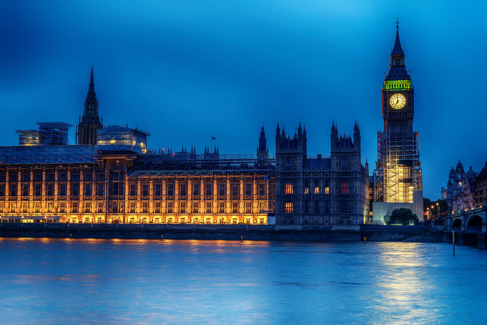 London, the United Kingdom: the Palace of Westminster with Big Ben, Elizabeth Tower, viewed from across the River Thames at night