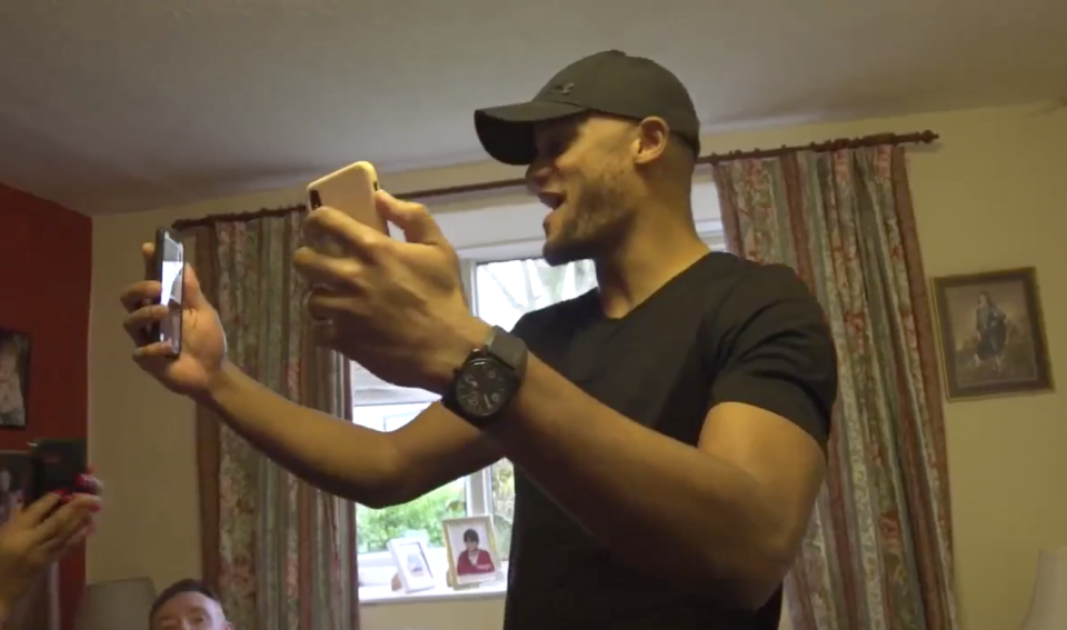 Vincent Kompany celebrates Manchester City’s Premier League title with teammates. (Screenshot: Manchester City on Periscope)