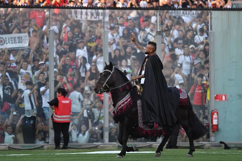 Chilean footballer Arturo Vidal is presented as a Colo-Colo player on horseback in front of a packed Monumental Stadium. Oscar Guerra/Agencia Uno/dpa