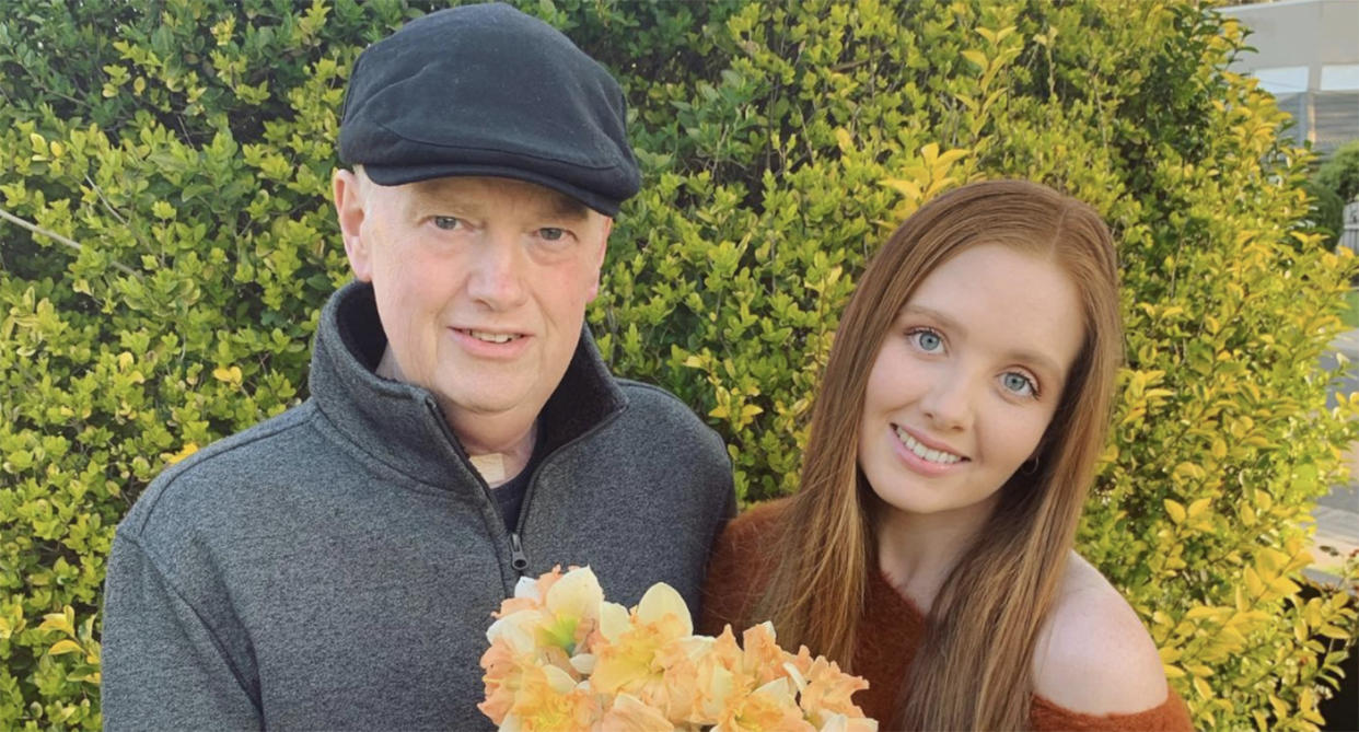 Andrew Coles and his daughter Brittany after he finished treatment for throat cancer in 2019.