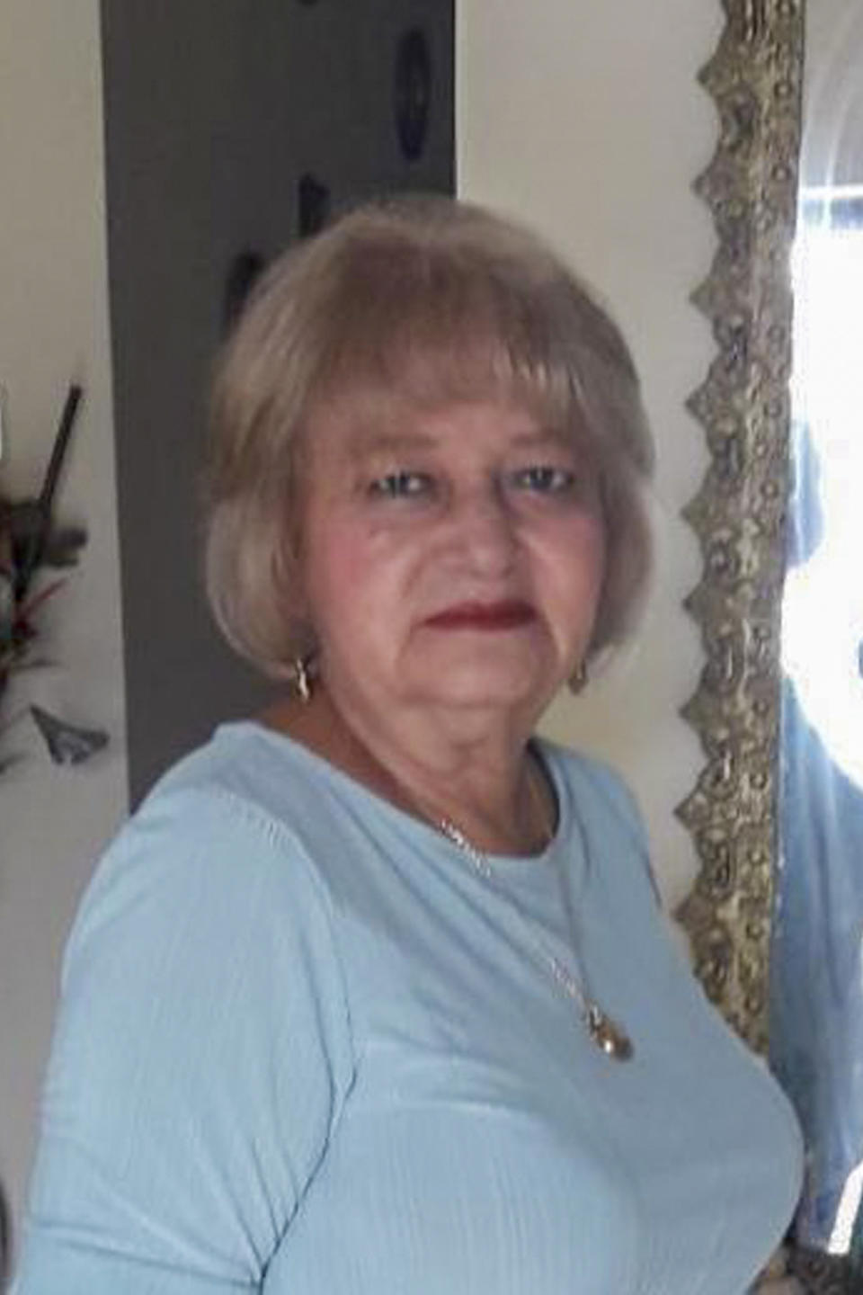 This 2019 photo provided by the Lamilla Family shows Bella Lamilla, a retired school teacher who was Ecuador's first confirmed coronavirus case. Even as Ecuador's coronavirus “patient zero” agonized in intensive care, strangers began tearing her reputation apart online. Lamilla is an example of how for patients and loved ones, coronavirus can come with stigma and re-victimization. (Courtesy of Lamilla Family via AP)