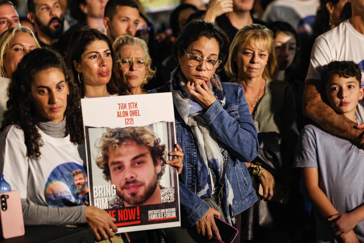 Relatives, friends and supporters of Alon Ohel, who is held hostage by Hamas, take part in a demonstration (AFP via Getty Images)
