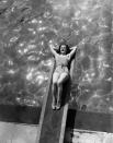 <p>Diving boards aren't just for diving. As this woman shows us, they make the perfect chaise lounge. </p>