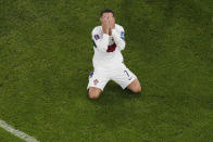 Portugal's Cristiano Ronaldo, reacts after he failed to score during the World Cup quarterfinal soccer match between Morocco and Portugal, at Al Thumama Stadium in Doha, Qatar, Saturday, Dec. 10, 2022. (AP Photo/Thanassis Stavrakis)