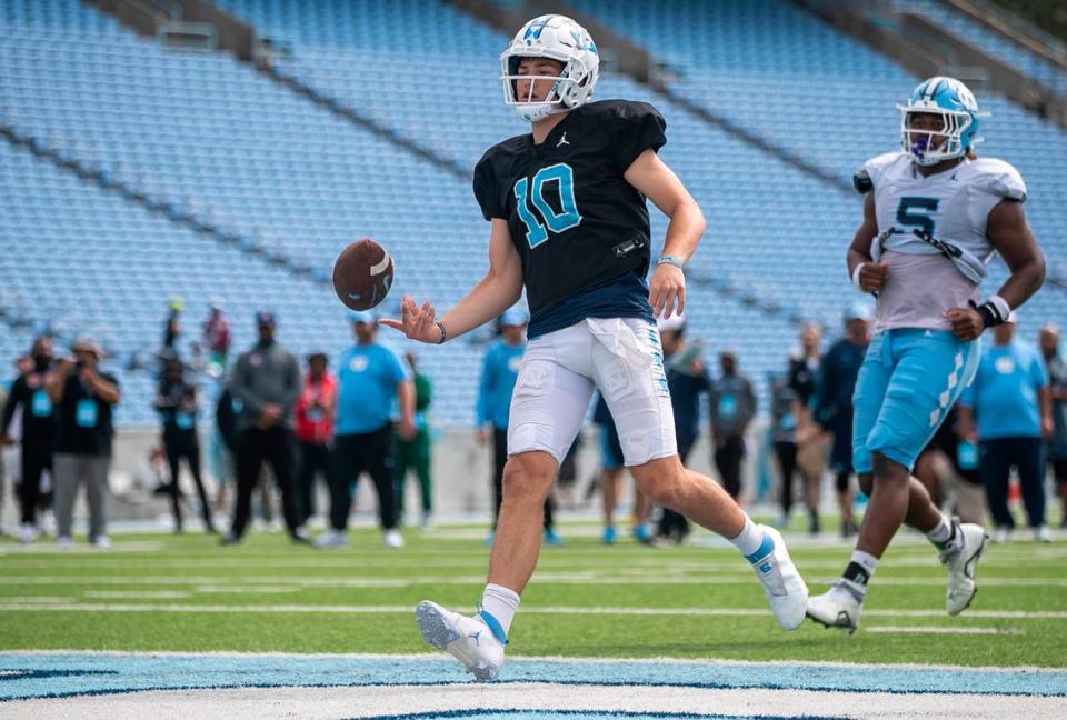 North Carolina quarterback Drake Maye (10) scores a touchdown on a short run during a scrimmage at the Tar Heels’ open practice on Saturday, March 25, 2023 at Kenan Stadium in Chapel Hill. N.C.