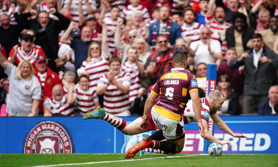 Wigan’s Liam Marshall scores the decisive try three minutes from time.