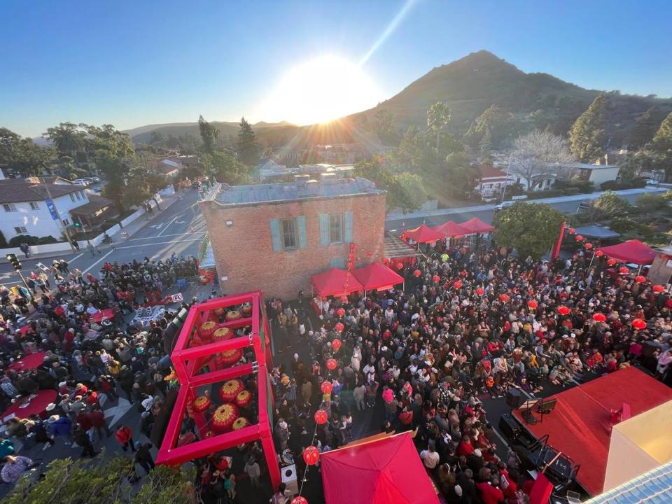 A block party took over downtown San Luis Obispo on Feb. 10, 2024, with hundreds of people packing Palm Street in front of the Ah Louis Store to celebrate not only the building’s 150th anniversary, but also Lunar New Year. 