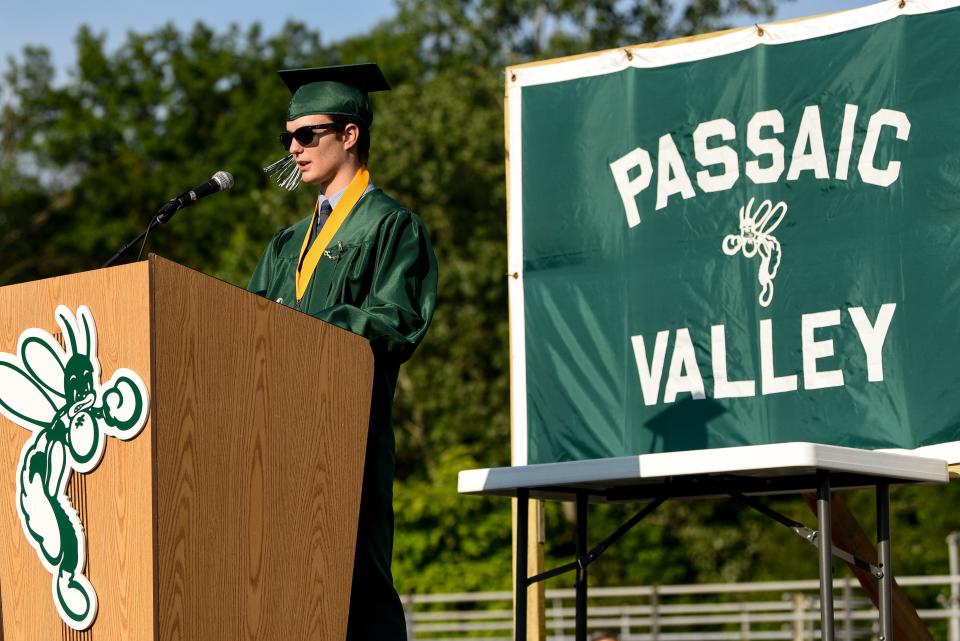 Passaic Valley Regional High School held a socially distant graduation ceremony over the course of two days in Little Falls, NJ. 2020 Class President Edward Bennett speaks on the second day of the ceremonies on Wednesday July 15, 2020. 