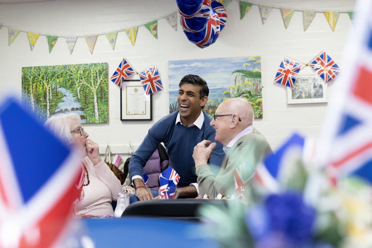 Sunak at the Royal Voluntary Service Mill End lunch club on Monday (PA)