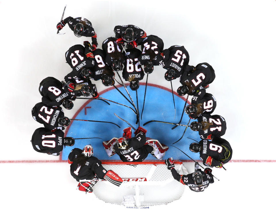 Team Canada talk before thre game prior to the Women's Ice Hockey Preliminary Round Group A Game against Switzerland on day 1 of the Sochi 2014 Winter Olympics at Shayba Arena on February 8, 2014 in Sochi, Russia. 