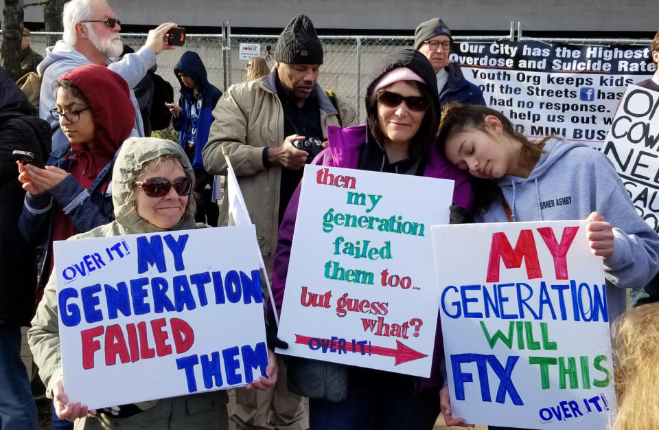 Family members Jan, Becky and Amy hold signs at the March for Our Lives in Washington, D.C. (Christopher Wilson/Yahoo News)