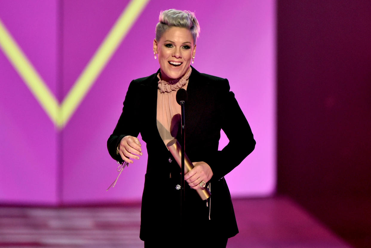 SANTA MONICA, CALIFORNIA - NOVEMBER 10: 2019 E! PEOPLE'S CHOICE AWARDS -- Pictured: Pink accepts People's Champion of 2019 award on stage during the 2019 E! People's Choice Awards held at the Barker Hangar on November 10, 2019 -- NUP_188997 (Photo by: Alberto Rodriguez/E! Entertainment/NBCU Photo Bank)