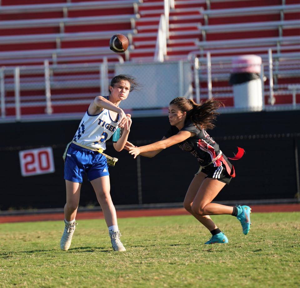 Martin County's Cali Scornavacca throws a pass during a high school flag football game against Vero Beach on Wednesday, Apr. 6, 2023 in Vero Beach. Martin County won 6-0.