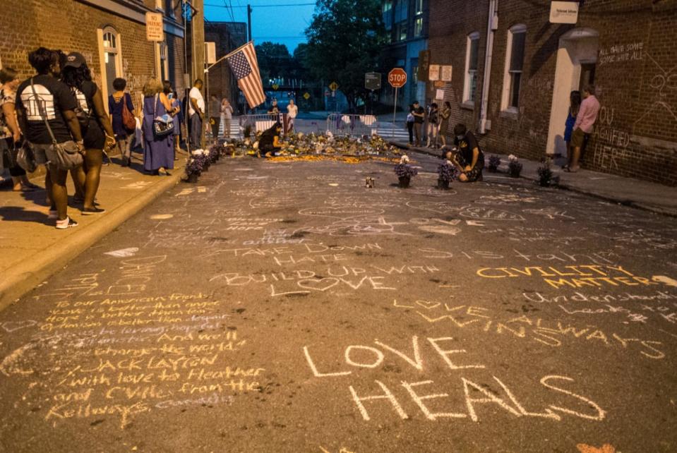 <div class="inline-image__caption"><p>Commemorative graffiti at the Heather Heyer memorial on Aug. 18, 2017 in Charlottesville, VA.</p></div> <div class="inline-image__credit">Bill Tompkins/Getty</div>