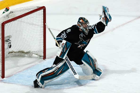 SAN JOSE, CA - MARCH 16: Aaron Dell #30 of the San Jose Sharks makes a glove save during a NHL game against the St. Louis Blues at SAP Center at San Jose on March 16, 2017 in San Jose, California. (Photo by Don Smith/NHLI via Getty Images)