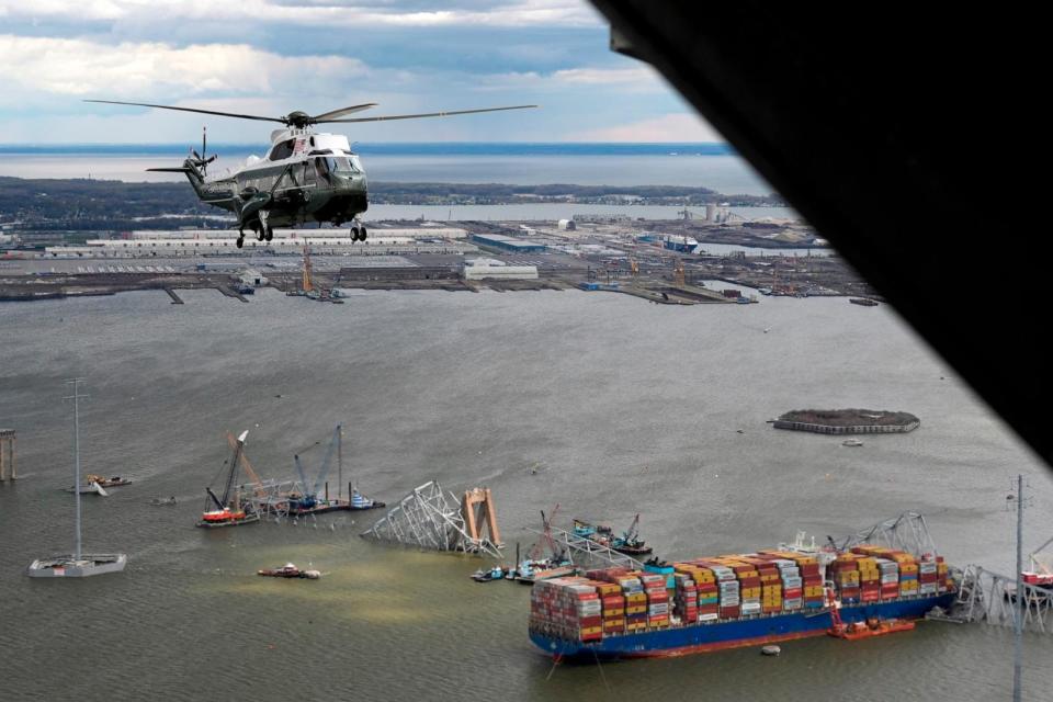 PHOTO: President Joe Biden, aboard Marine One, takes an aerial tour of the collapsed Francis Scott Key Bridge in Baltimore, on April 5, 2024, as seen from an accompanying aircraft.  (Manuel Balce Ceneta/AP)