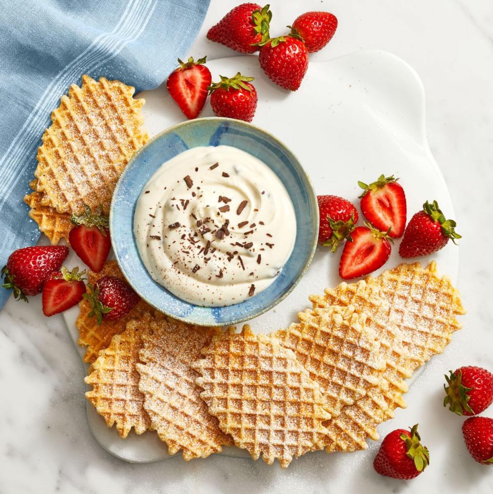 <p>For a sweeter Super Bowl snack, try this creamy Cannoli dip made with mascarpone, Ricotta, heavy cream and chocolate chips. </p><p>Get the <a href="https://www.goodhousekeeping.com/food-recipes/dessert/a39876132/cannoli-dip-recipe/" rel="nofollow noopener" target="_blank" data-ylk="slk:Cannoli Dip recipe;elm:context_link;itc:0;sec:content-canvas" class="link "><strong>Cannoli Dip recipe</strong></a>. </p>
