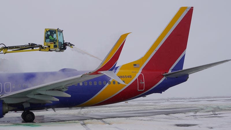 Integrated Deicing Services deices a Southwest Airlines plane before takeoff at Salt Lake City International Airport Wednesday, Feb. 22, 2023