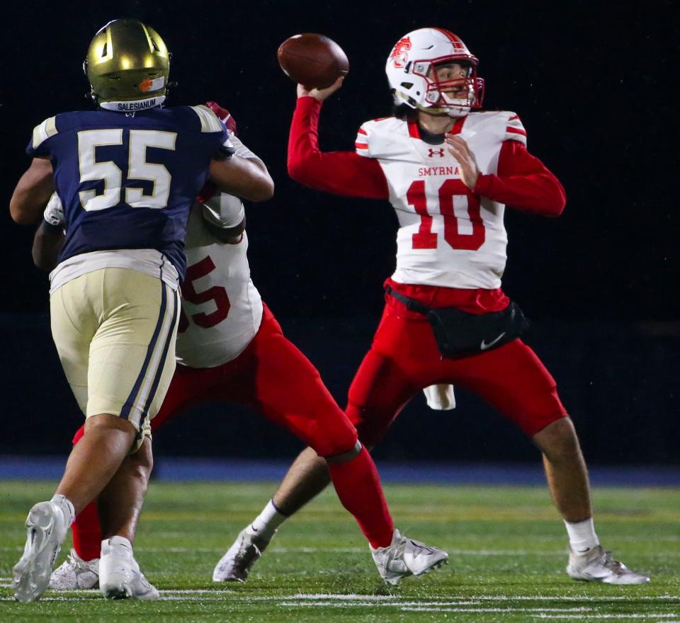 Smyrna's Jacob Tiberi throws in the third quarter of Salesianum's 41-40 win in the first round of the DIAA Class 3A tournament, Friday, Nov. 17, 2023 at Abessinio Stadium.