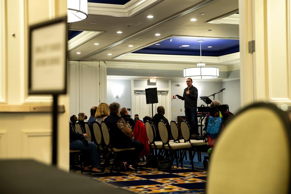 Tom Steele, lead pastor at Iowa City Church, speaks during a service Sunday at the Graduate Hotel in Iowa City. The congregation is gathering at the downtown hotel while a new church building is being constructed.