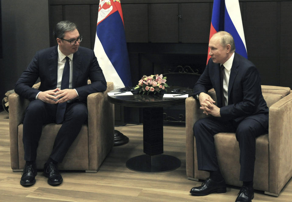 Russian President Vladimir Putin, right, and Serbian President Aleksandar Vucic speak during their meeting in Sochi, Russia, Thursday, Nov. 25, 2021. (Mikhail Klimentyev, Sputnik, Kremlin Pool Photo via AP)