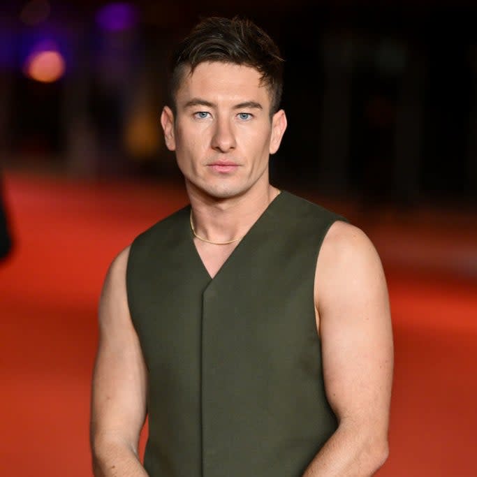 Barry in sleeveless top poses on red carpet