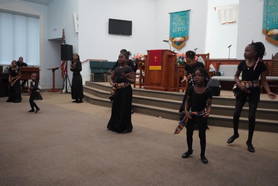 The New Testament Dancers of DaySpring Baptist Church perform to African drums during the Black History Month service held Sunday at the church in northeast Gainesville.
(Credit: Photo by Voleer Thomas, Correspondent)