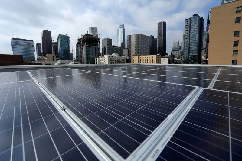 FILE PHOTO: Solar electric panels on residential bulding in down town Los Angeles